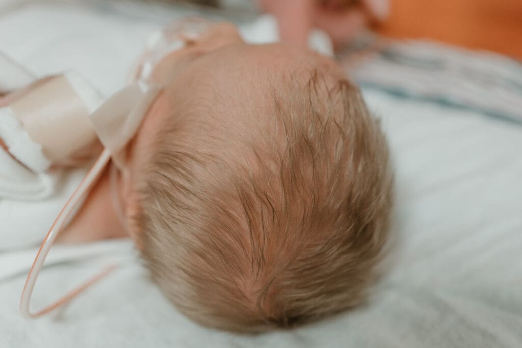 fuzzy blonde newborn baby hair fresh 48 session