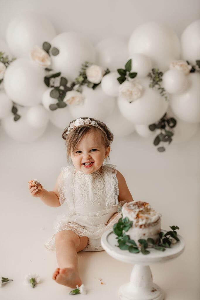 simple, neutral floral cake smash session in clarksville tn