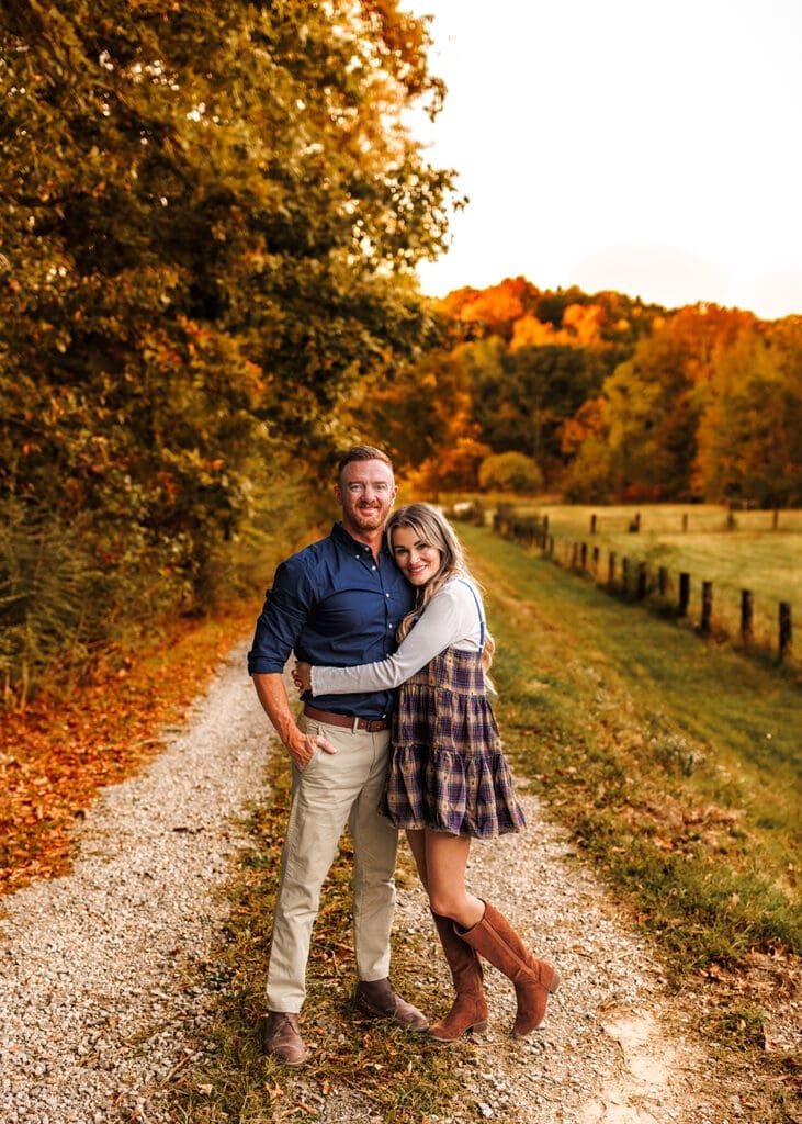 mom and dad posing during fall photography session