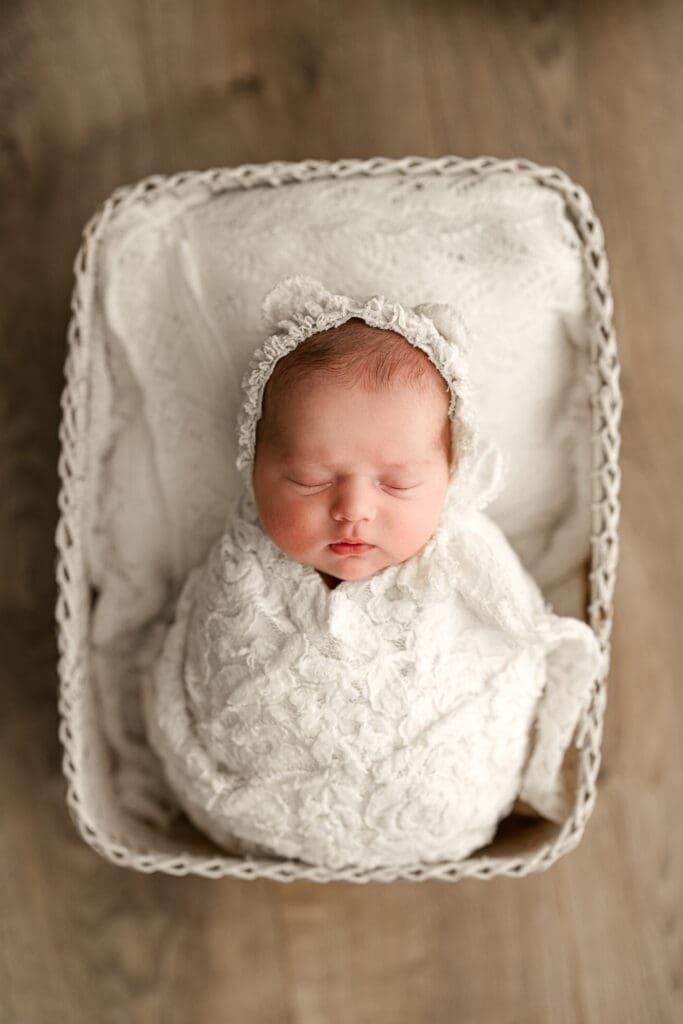 Studio newborn photography in Clarksville TN with neutral styling