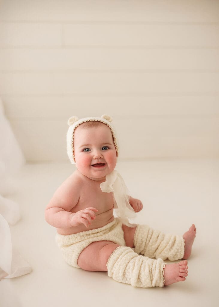 Chubby baby girl during her baby milestone session in Clarksville TN